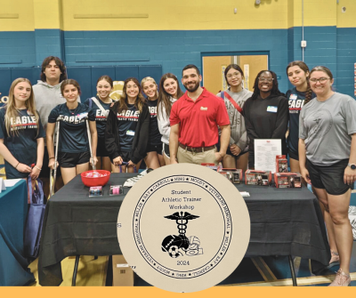Jeremy Villareal, Hest Fitness Products with group of students at 2024 Student Athletic Trainer Workshop at Moody High School