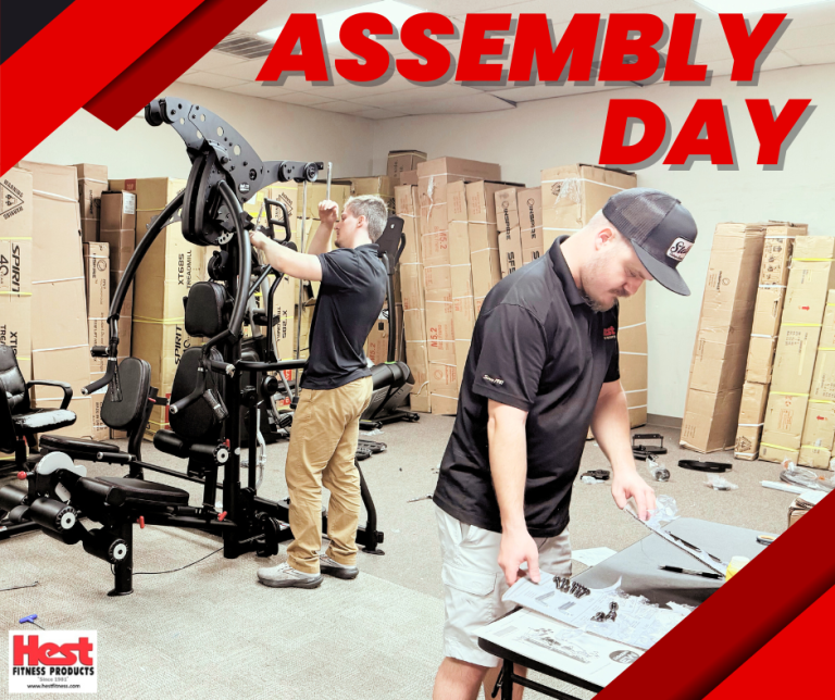 Caleb Price and Michael Schoggins assembling an Inspire M3 Multigym